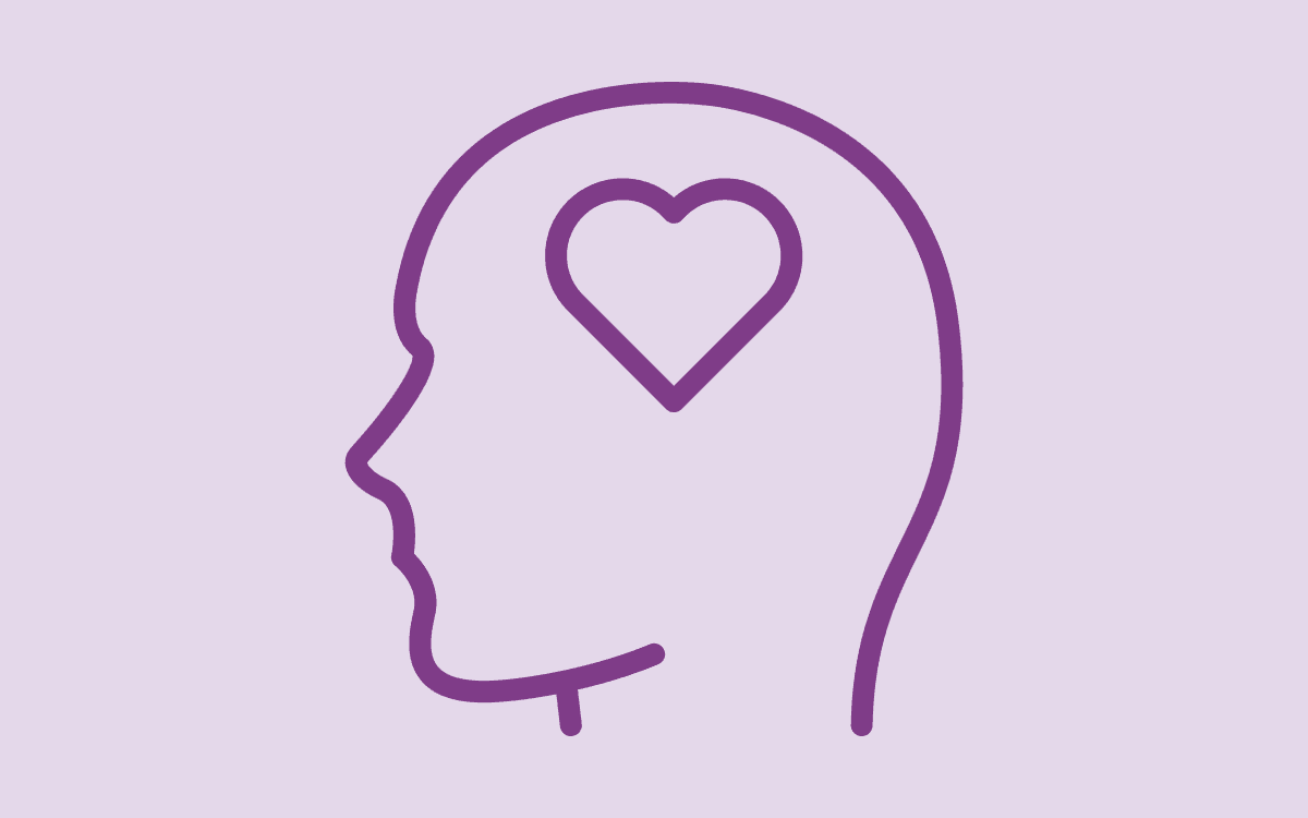 Head profile with heart icon