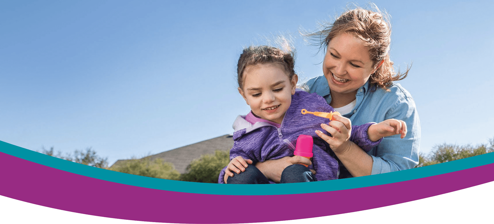 Adult and child outdoors